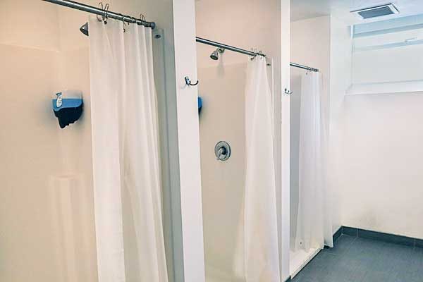 Showers inside the locker rooms at Ellis Athletic Center